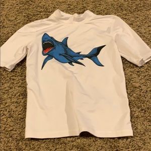 Never worn boys swim shirt